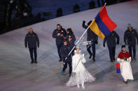 <p>Flag bearer Mikayel Mikayelyan of Armenia leads the team during the Opening Ceremony of the PyeongChang 2018 Winter Olympic Games at PyeongChang Olympic Stadium on February 9, 2018 in Pyeongchang-gun, South Korea. (Photo by Ronald Martinez/Getty Images) </p>