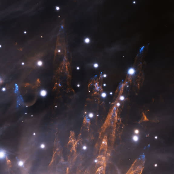 This image, obtained during the late commissioning phase of the GeMS adaptive optics system, with the Gemini South AO Imager (GSAOI) on the night of December 28, 2012, reveals exquisite details in the outskirts of the Orion Nebula.