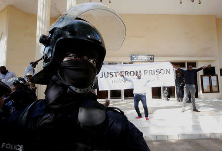 Partisans of Gambian political prisoners protest at the Supreme Court for trial in Banjul, Gambia December 5, 2016. REUTERS/ Thierry Gouegnon