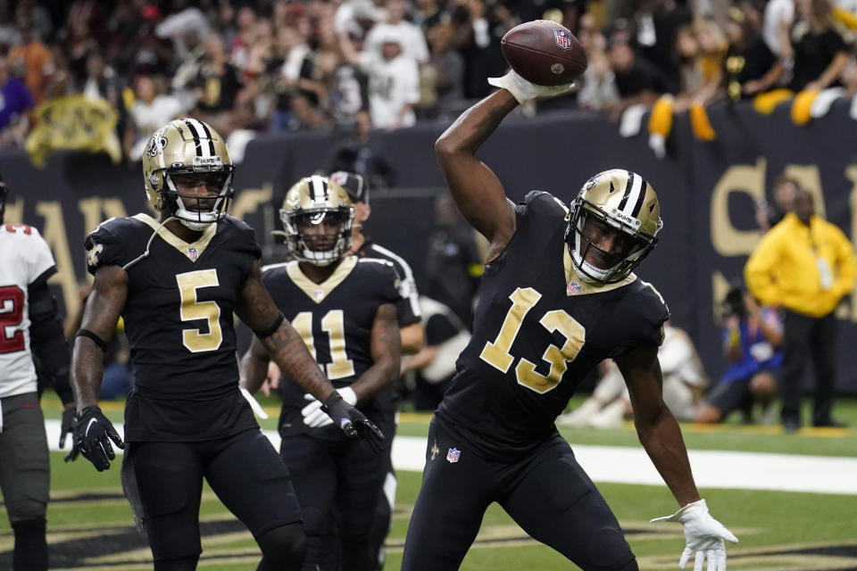 New Orleans Saints wide receiver Michael Thomas celebrates after scoring against the Tampa Bay Buccaneers during the second half of an NFL football game in New Orleans, Sunday, Sept. 18, 2022. (AP Photo/Gerald Herbert)