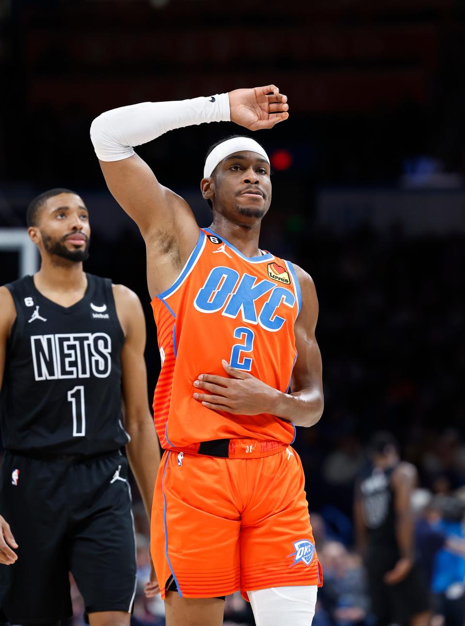 Mar 14, 2023; Oklahoma City, Oklahoma, USA; Oklahoma City Thunder guard Shai Gilgeous-Alexander (2) stretches after a play against the Brooklyn Nets during the second quarter at Paycom Center. Mandatory Credit: Alonzo Adams-USA TODAY Sports