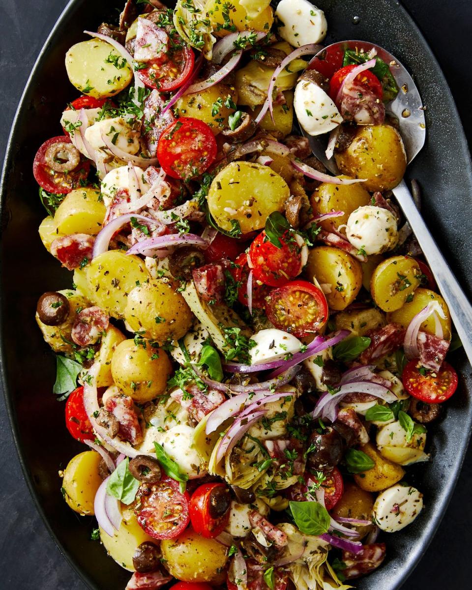 antipasto potato salad tossed together with fresh basil and parsley