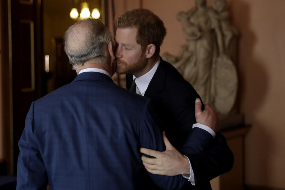 Prince Harry kisses King Charles on the cheek