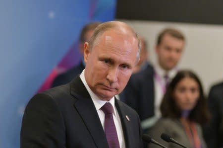 Russia's President Vladimir Putin attends a news conference on the sidelines of the East Asia Summit in Singapore November 15, 2018. Sputnik/Alexei Druzhinin/Kremlin via REUTERS