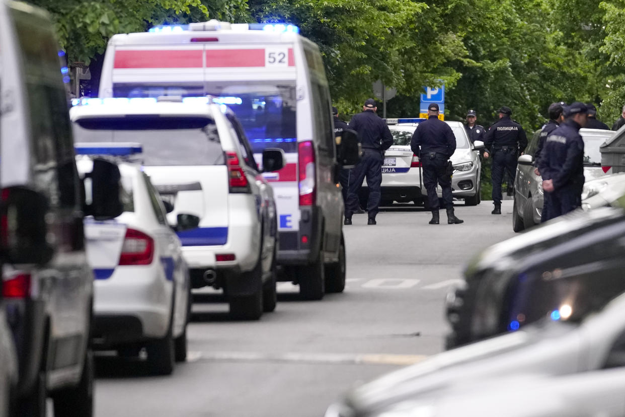 Police block streets around the Vladislav Ribnikar school in Belgrade, Serbia, Wednesday, May 3, 2023. A teenage boy opened fire early Wednesday in a school in central Belgrade, causing injuries. (AP Photo/Darko Vojinovic)