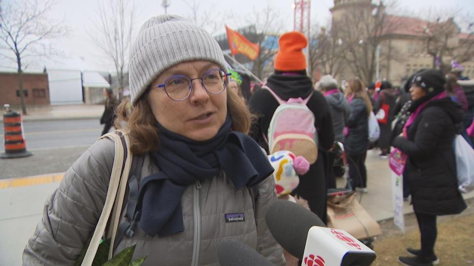 Ania Poradzisz said she feels fortunate to live in Canada, where she could march and celebrate International Women's Day. She hopes women around the world get to say the same about their countries.