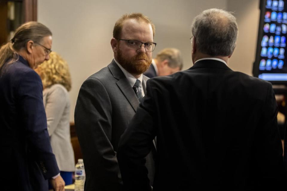 <div class="inline-image__caption"><p>Travis McMichael looks back at his mother and sister in the courtroom after the jury convicted him for the murder of Ahmaud Arbery.</p></div> <div class="inline-image__credit">Photo by Stephen B. Morton-Pool/Getty Images</div>