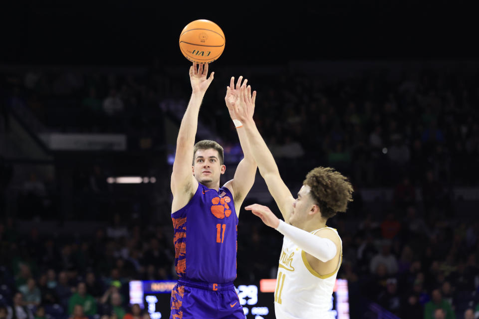 SOUTH BEND, INDIANA – MARCH 02: Joseph Girard III #11 of the Clemson Tigers takes a shot over Braeden Shrewsberry #11 of the Notre Dame Fighting Irish during the second half at Joyce Center on March 02, 2024 in South Bend, Indiana. (Photo by Justin Casterline/Getty Images)