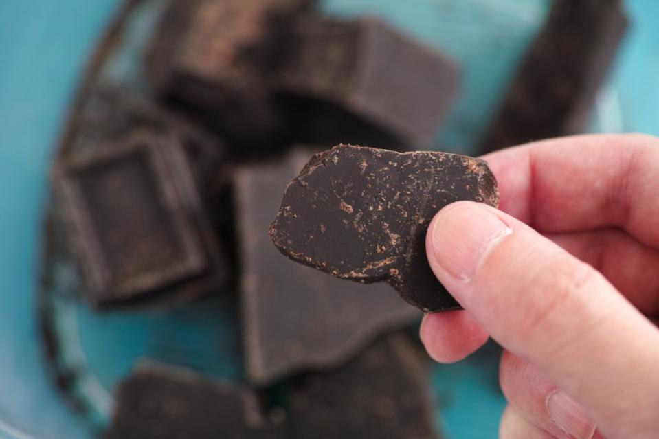 A 2022 study found that participants had better moods after eating 10 grams of dark chocolate with 85% cocoa content three times a day. Getty Images/iStockphoto