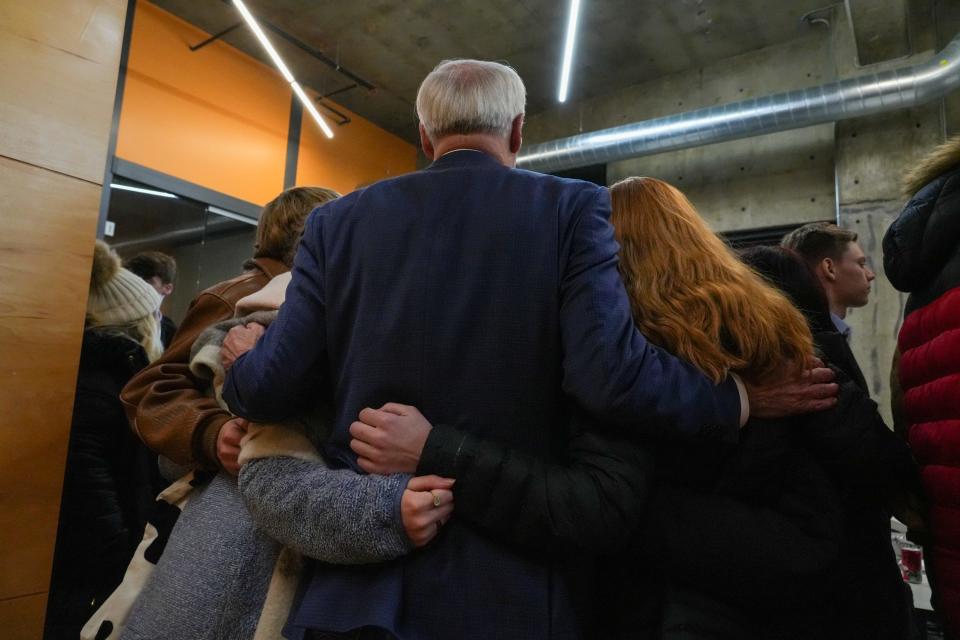 Former Arkansas Gov. Asa Hutchinson poses for a photo with students at a meet and greet on Saturday, Jan. 13, 2024, at Gravitate Coworking (Downtown) in Des Moines.