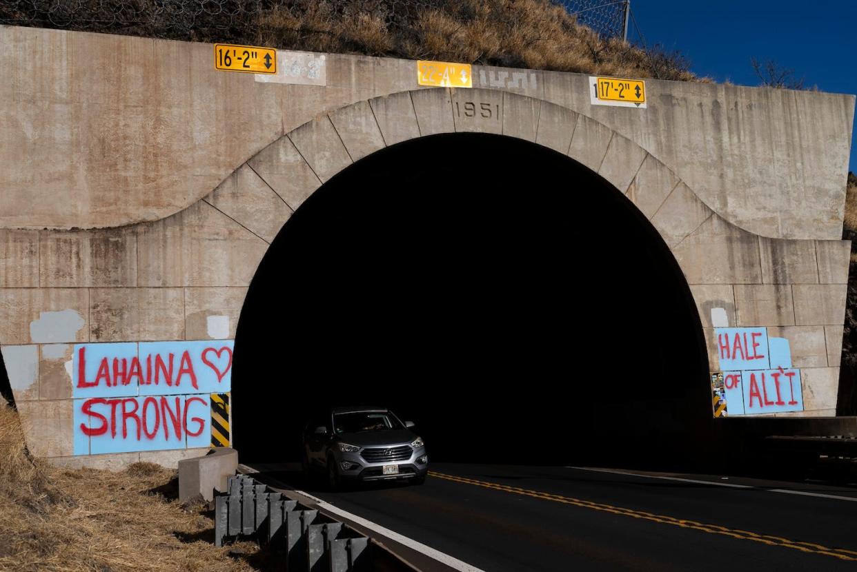 Encouraging words were painted on a tunnel near Lahaina, Hawaii, on Thursday.