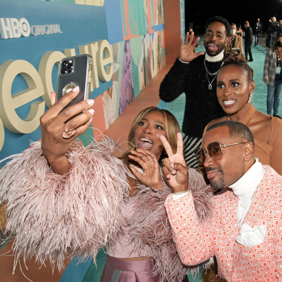 From left: Yvonne Orji, Jay Ellis, Issa Rae, and Prentice Penny attend the premiere of Insecure Season 5 at Kenneth Hahn Park on Oct. 21, 2021 in Los Angeles.<span class="copyright">Jeff Kravitz—FilmMagic for HBO/Getty Images</span>