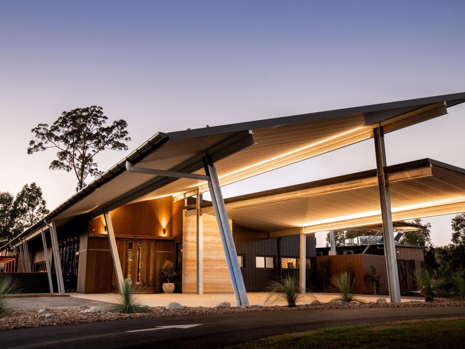 A view of the lodge at sunset.