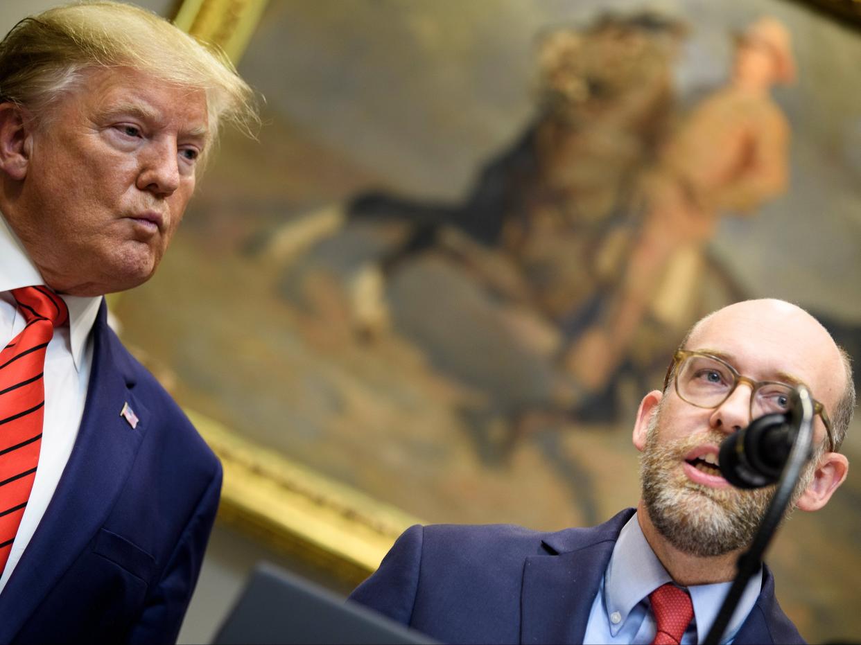 Donald Trump listens while acting OMB Director Russell Vought speaks in the Roosevelt Room of the White House October 9, 2019. (AFP via Getty Images)