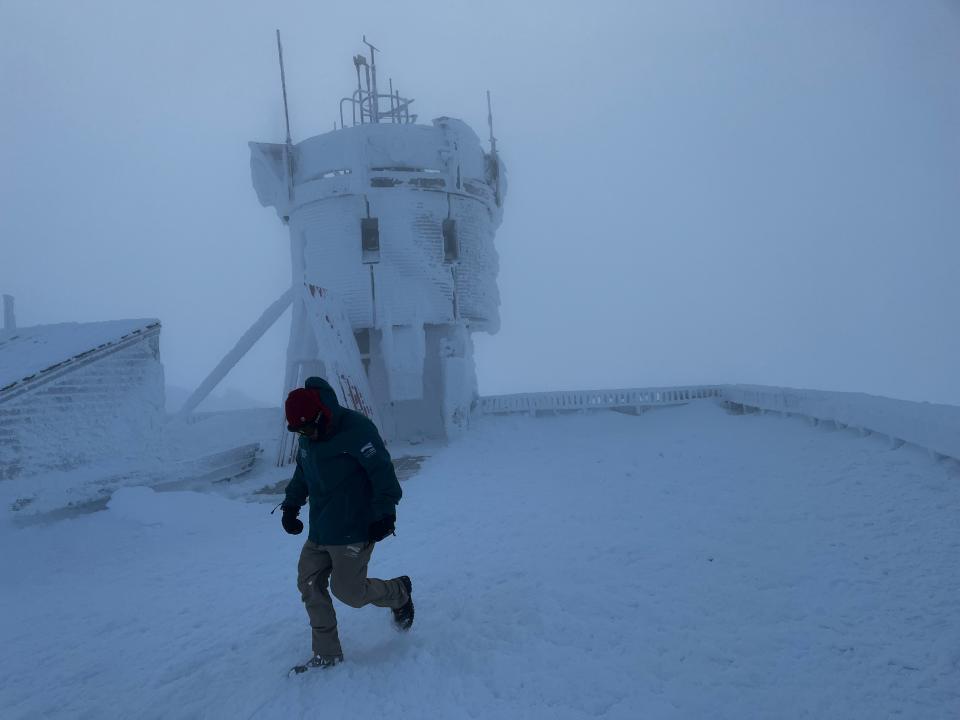 Francis Tarasiewicz, a weather observer and education specialist at the Mount Washington Observatory, during a trek to the observatory's weather station on the summit of Mount Washington in New Hampshire on Nov. 29, 2023.