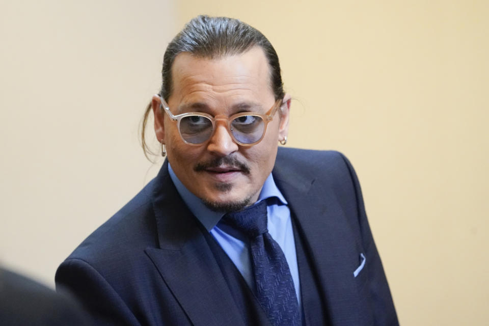 Actor Johnny Depp appears in the courtroom at the Fairfax County Circuit Courthouse in Fairfax, Va., Friday, May 27, 2022. Actor Johnny Depp sued his ex-wife Amber Heard for libel in Fairfax County Circuit Court after she wrote an op-ed piece in The Washington Post in 2018 referring to herself as a "public figure representing domestic abuse." (AP Photo/Steve Helber, Pool)