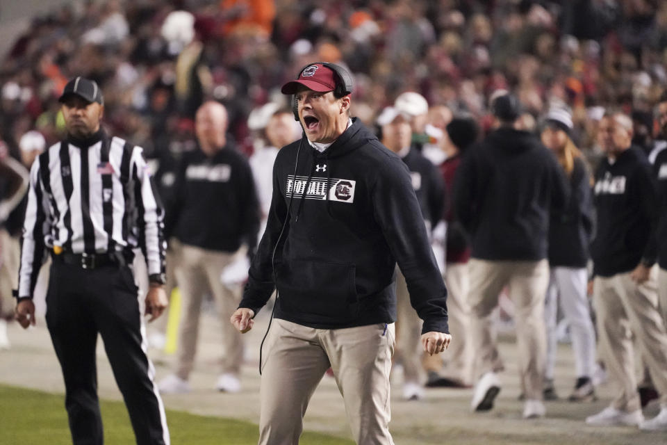 FILE - South Carolina coach Shane Beamer shouts to players during the second half of the team's NCAA college football game against Clemson in Columbia, S.C., Saturday, Nov. 27, 2021. South Carolina starts their season against Georgia State on Sept. 3, 2022. (AP Photo/Sean Rayford, File)