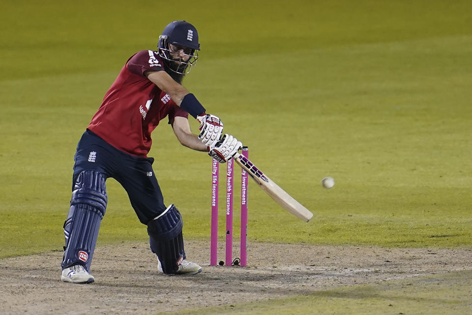 England's Moeen Ali bats during the third Twenty20 cricket match between England and Pakistan, at Old Trafford in Manchester, England, Tuesday, Sept. 1, 2020. (AP Photo/Jon Super, Pool)
