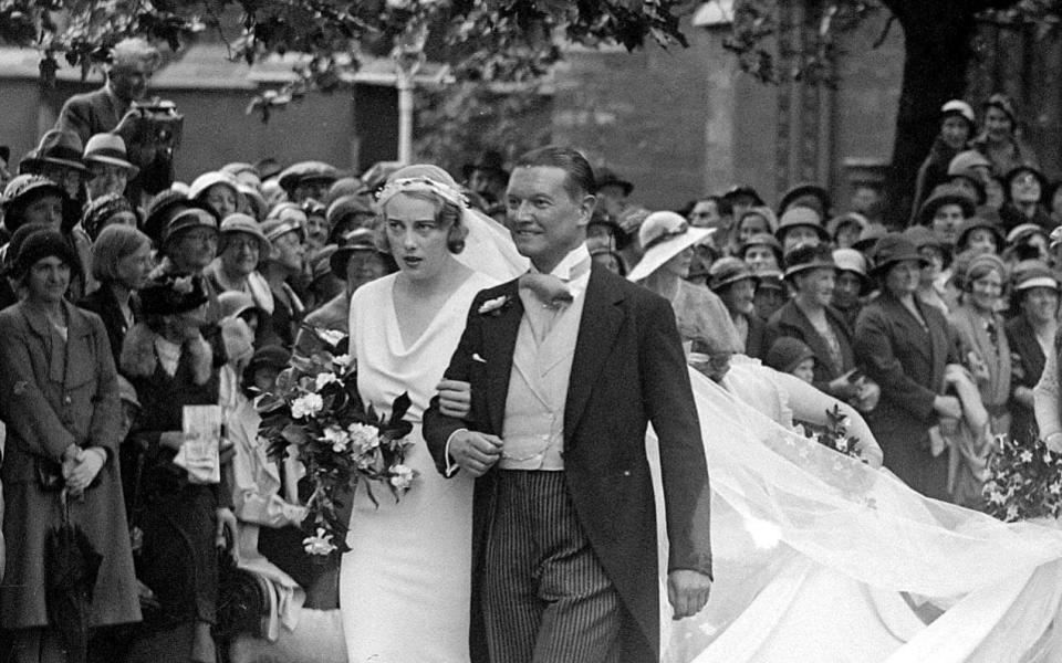 Lady Honor Guinness and Chips Cannon on their wedding day; London, 1933 - TopFoto