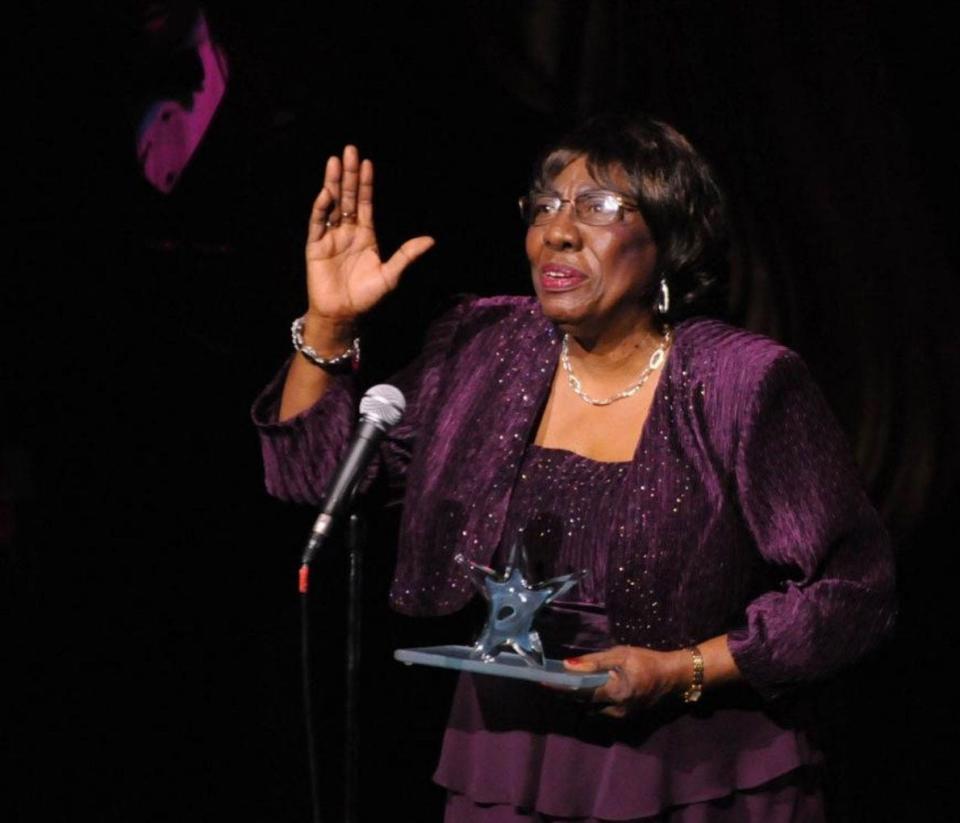 Lela Thompson, a founding member of The Willis Richardson Players, accepts the Enduring Contribution to Wilmington Theater Award named for her in 2012 at Thalian Hall.
