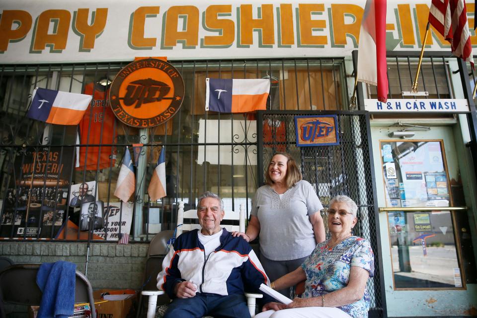 Julianne Haddad stands by her parents Maynard and Anita Haddad outside of her dad's restaurant, H&H Coffee Shop, 701 Yandell Drive, on May 6, 2021. Owner Maynard Haddad often could be seen sitting outside the shop.