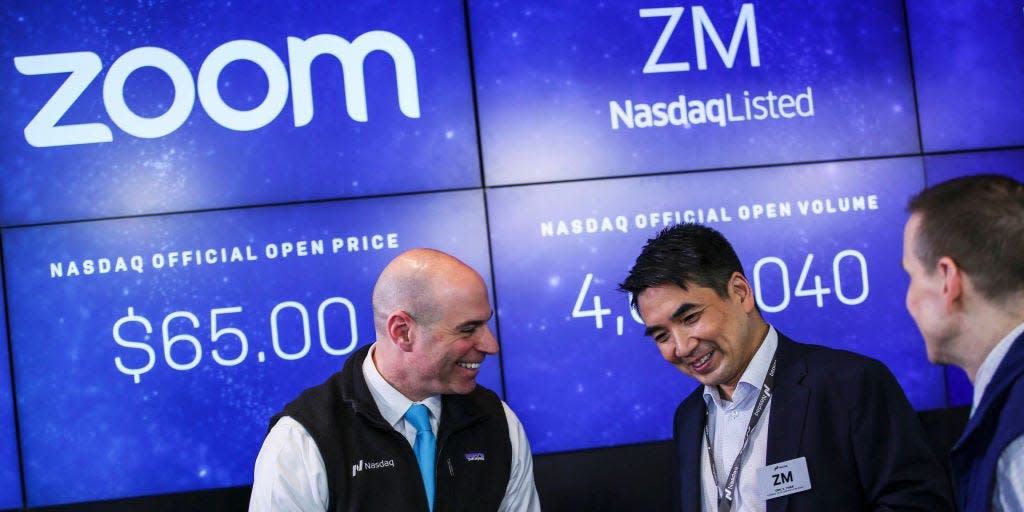 Zoom founder Eric Yuan speaks with a treader after the Nasdaq opening bell ceremony on April 18, 2019 in New York City.