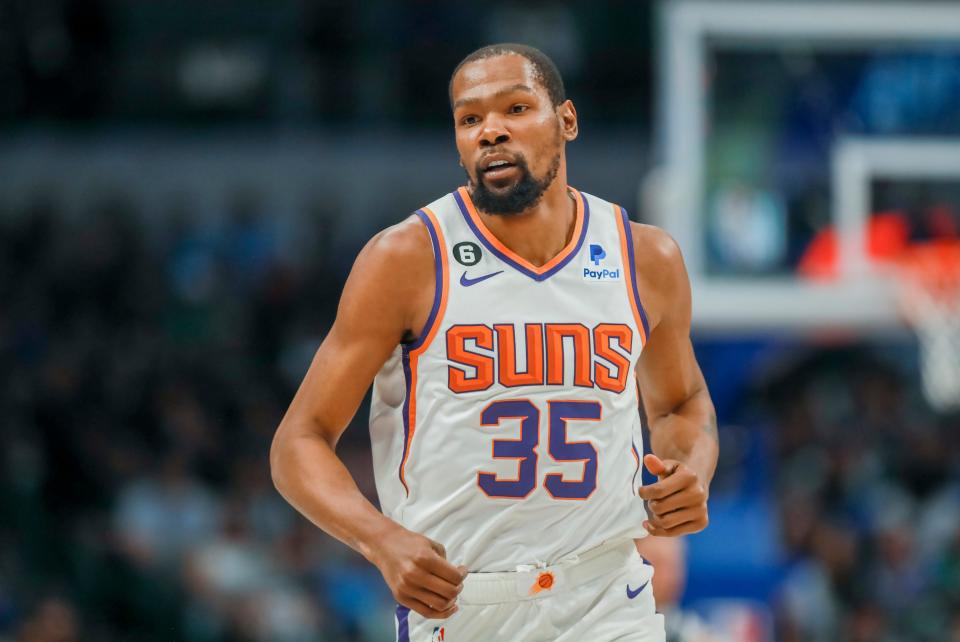 Phoenix Suns forward Kevin Durant runs downcourt during the first half of an NBA basketball game against the Dallas Mavericks on March 5, 2023, in Dallas.