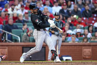 Arizona Diamondbacks' Christian Walker hits a three-run home run against the St. Louis Cardinals during the third inning of a baseball game Tuesday, April 23, 2024, in St. Louis. (AP Photo/Scott Kane)