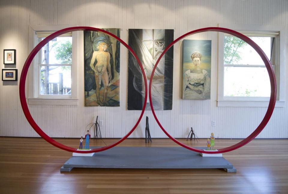 Artwork by longtime partners Eugene Phillips and Montserrat Wassam hangs in the gallery inside the Miyazaki Bath House in the delta town of Walnut Grove in 2014.