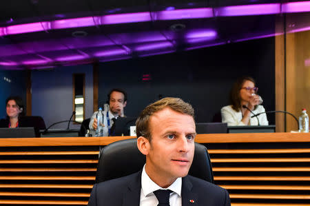 French President Emmanuel Macron attends a round table meeting at an informal EU summit on migration at EU headquarters in Brussels, Belgium June 24, 2018. Geert Vanden Wijngaert/Pool via Reuters