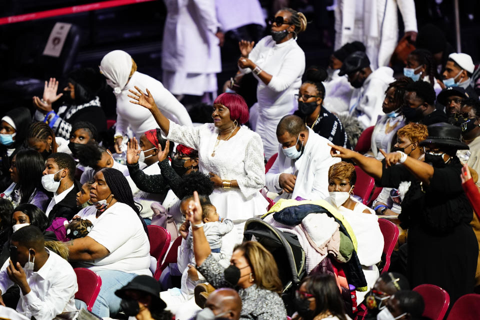 Mourners gather to pay their respects for the victims of a deadly row house fire during funeral services at Temple University in Philadelphia, Monday, Jan. 17, 2022. Officials say it was the city's deadliest single fire in at least a century. (AP Photo/Matt Rourke)