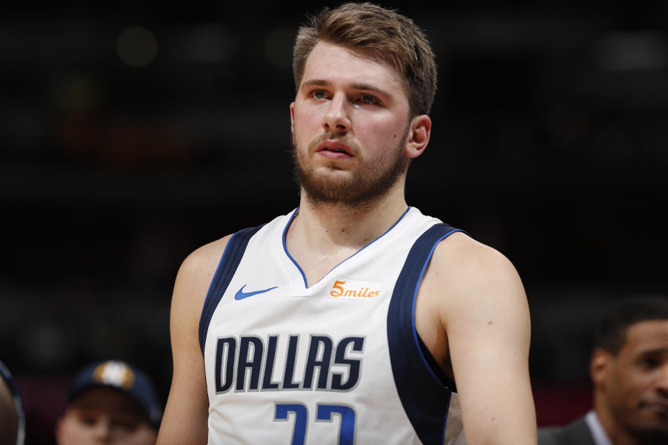 Dallas Mavericks forward Luka Doncic (77) in the second half of an NBA basketball game Thursday, March 14, 2019, in Denver. The Nuggets won 100-99. (AP Photo/David Zalubowski)