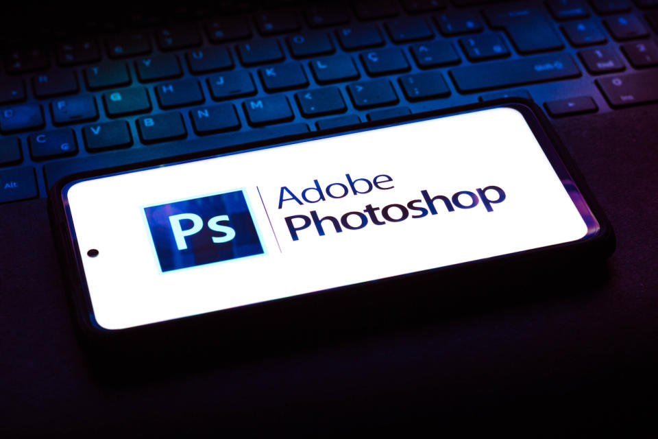 BRAZIL - 2021/10/12: In this photo illustration the Adobe Photoshop logo seen displayed on a smartphone on the background of a pc keyboard. (Photo Illustration by Rafael Henrique/SOPA Images/LightRocket via Getty Images)