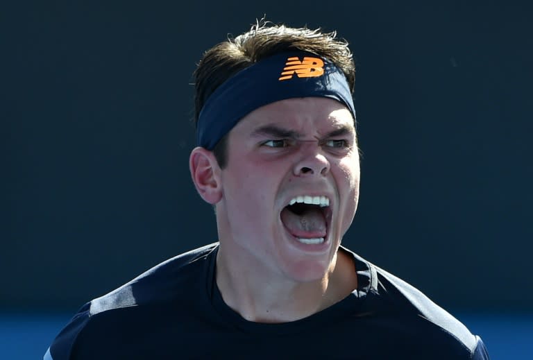 Milos Raonic celebrates victory against Spain's Tommy Robredo in their second round match at the Australian Open in Melbourne on January 21, 2016