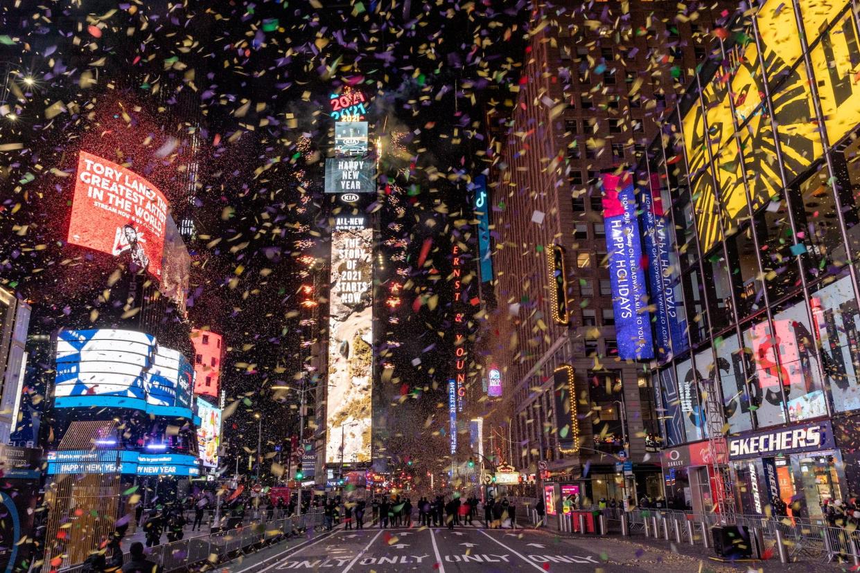 Confetti flies around the ball and countdown clock in Times Square during the virtual New Year's Eve event New York, U.S., January 1, 2021.