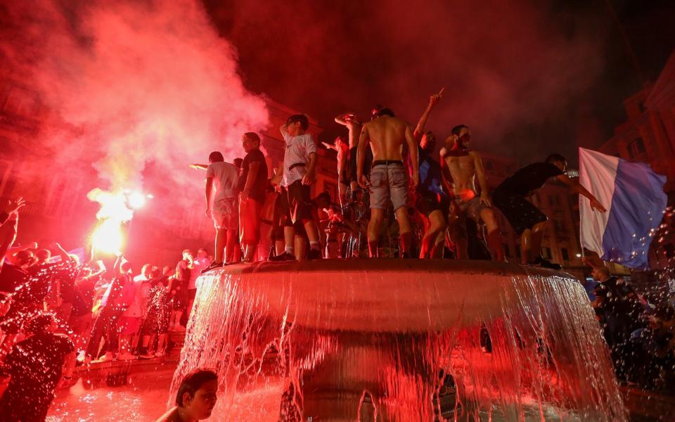 Napoli fans celebrate in the City centre - From Maradona to the Camorra: How Naples became a football cauldron - Getty Images/Marco Cantile