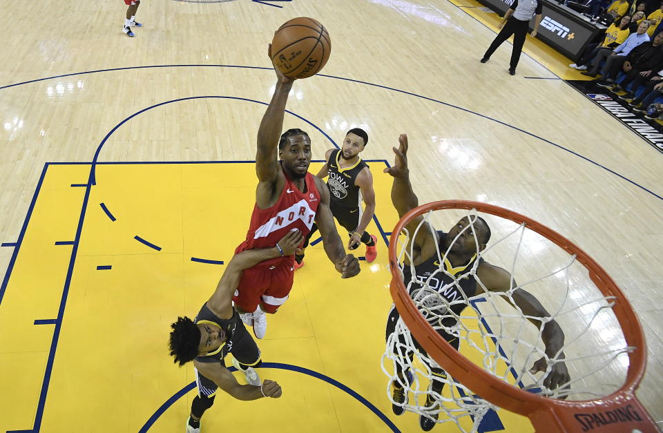 Toronto Raptors forward Kawhi Leonard #2 shoots against the Golden State Warriors during the second half of Game 6 of basketball's NBA Finals in Oakland, California. (Photo byAP Photo/Kyle Terada, Pool)