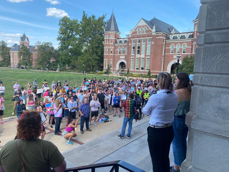 More than 200 gathered Friday at Jesse Hall at the University of Missouri to protest MU Health Care's decision to end treatment for transgender youth.