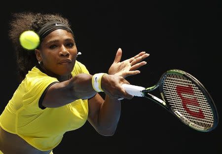 Serena Williams of the U.S. hits a shot during her quarter-final match against Russia's Maria Sharapova at the Australian Open tennis tournament at Melbourne Park, Australia, January 26, 2016. REUTERS/Issei Kato