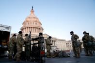 <p>Weapons are distributed to members of the National Guard outside the U.S. Capitol on January 13, 2021 in Washington, DC.</p>