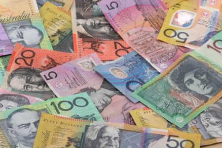 Aussie loses some ground, kiwi holds steady vs. greenback; eyes on Fed minutes