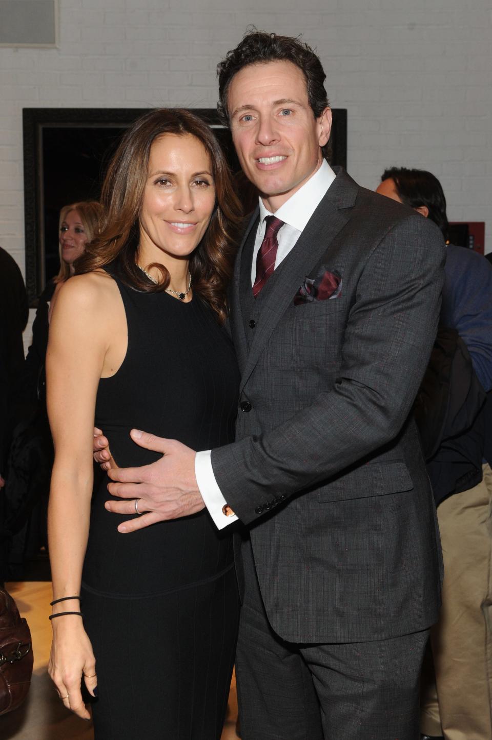 Cristina Cuomo and Chris Cuomo attend the Opening Of John Varvatos Madison Avenue on April 3, 2014 in New York City.