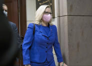 Rep. Liz Cheney, R-Wyo., arrives as House GOP members meet to decide whether she should be removed from her leadership role as chair of the Republican Conference after she repeatedly rebuked former President Donald Trump for his false claims of election fraud and his role in instigating the Jan. 6 U.S. Capitol attack, at the Capitol in Washington, Wednesday, May 12, 2021. (AP Photo/J. Scott Applewhite)