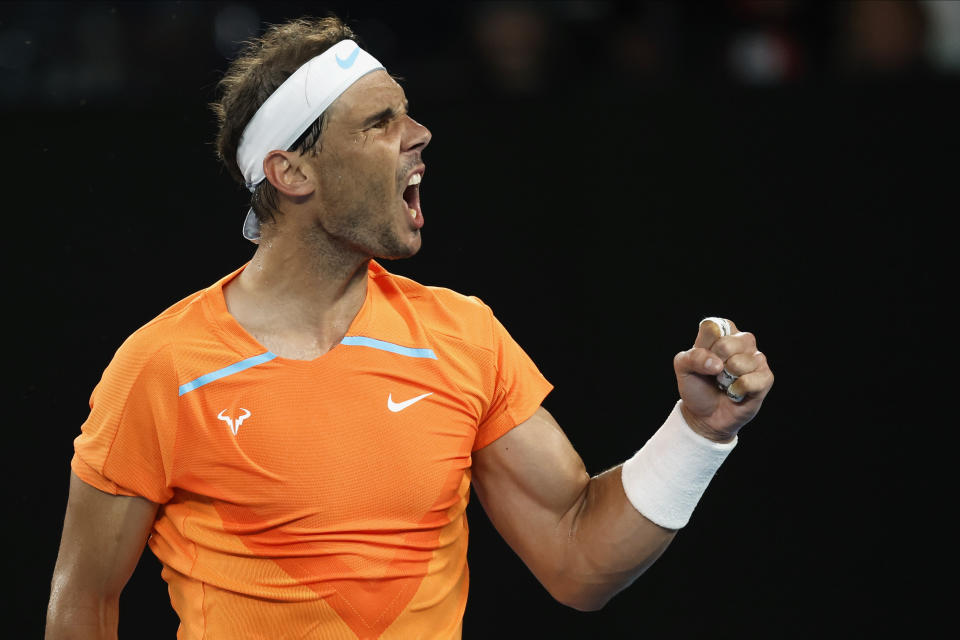 Rafael Nadal of Spain reacts after winning a point against Mackenzie McDonald of the U.S. during their second round match at the Australian Open tennis championship in Melbourne, Australia, Wednesday, Jan. 18, 2023. (AP Photo/Asanka Brendon Ratnayake)