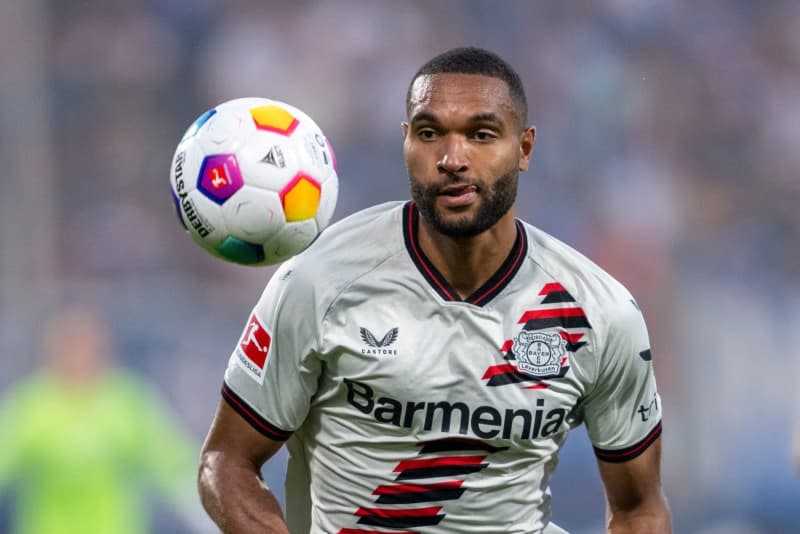 Leverkusen's Jonathan Tah runs after the ball during the German Bundesliga soccer match between VfL Bochum and Bayer Leverkusen. Tah was unveiled as the second German squad member for Euro 2024 on 13 May. David Inderlied/dpa