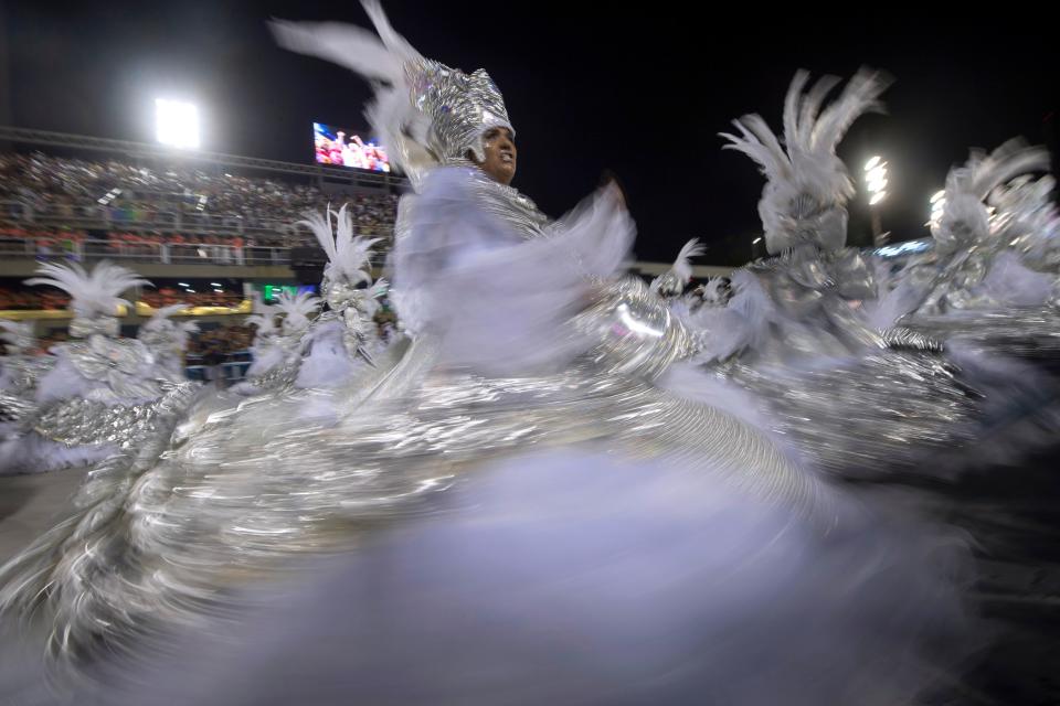 Members of Salgueiro perform. (Photo: MAURO PIMENTEL via Getty Images)