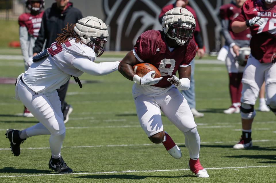 Jacardia Wright runs a drill during the Missouri State football practice at Plaster Stadium on Saturday, March 26, 2022.