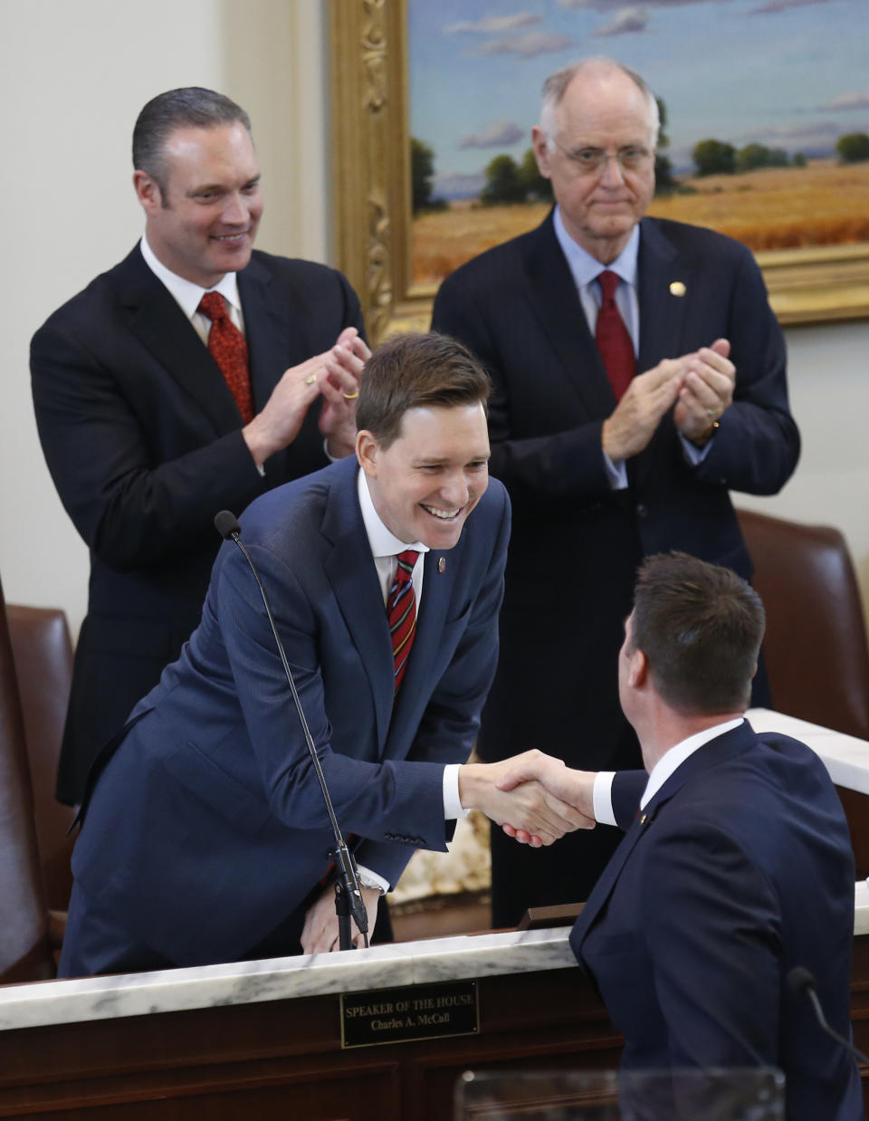 Oklahoma Lt. Gov. Matt Pinnell, left, greets Gov. Kevin Stitt, right, who arrives for the State of the State in Oklahoma City, Monday, Feb. 4, 2019. (AP Photo/Sue Ogrocki)