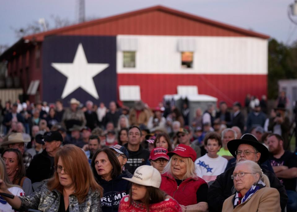 People listen at Thursday's Take Our Border Back convoy rally.