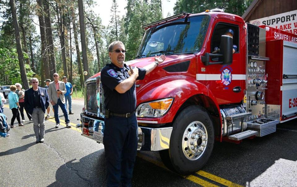 Shaver Lake Fire Dept Assistant Chief James Parr talks about the new fire engine E-260 for Shaver Lake’s Volunteer Fire Department as the community gathered for a time-honored push-in tradition Thursday afternoon, Aug. 24, 2023 in Shaver Lake.